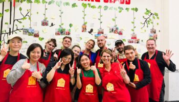 Students learning authentic Vietnamese cooking in Da Nang
